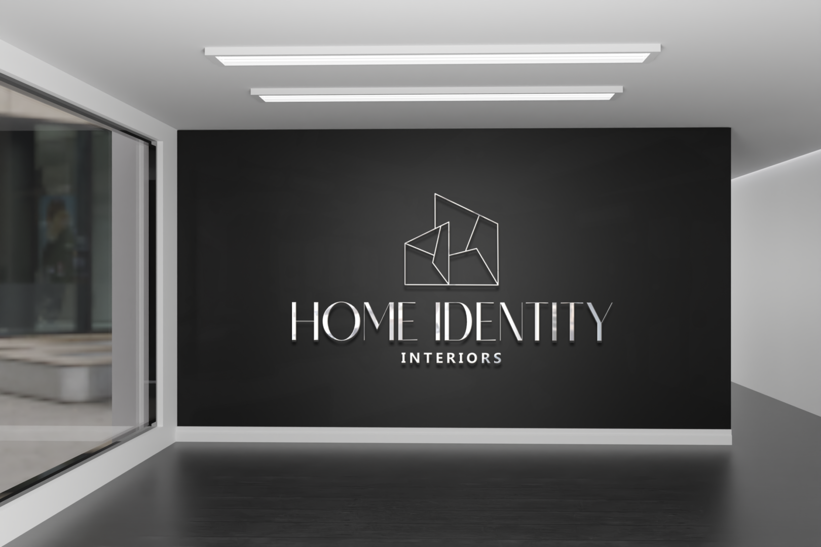 A room with a wall that says home identity interiors.