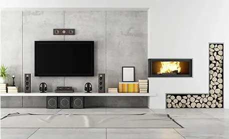 A living room with a fireplace and a tv