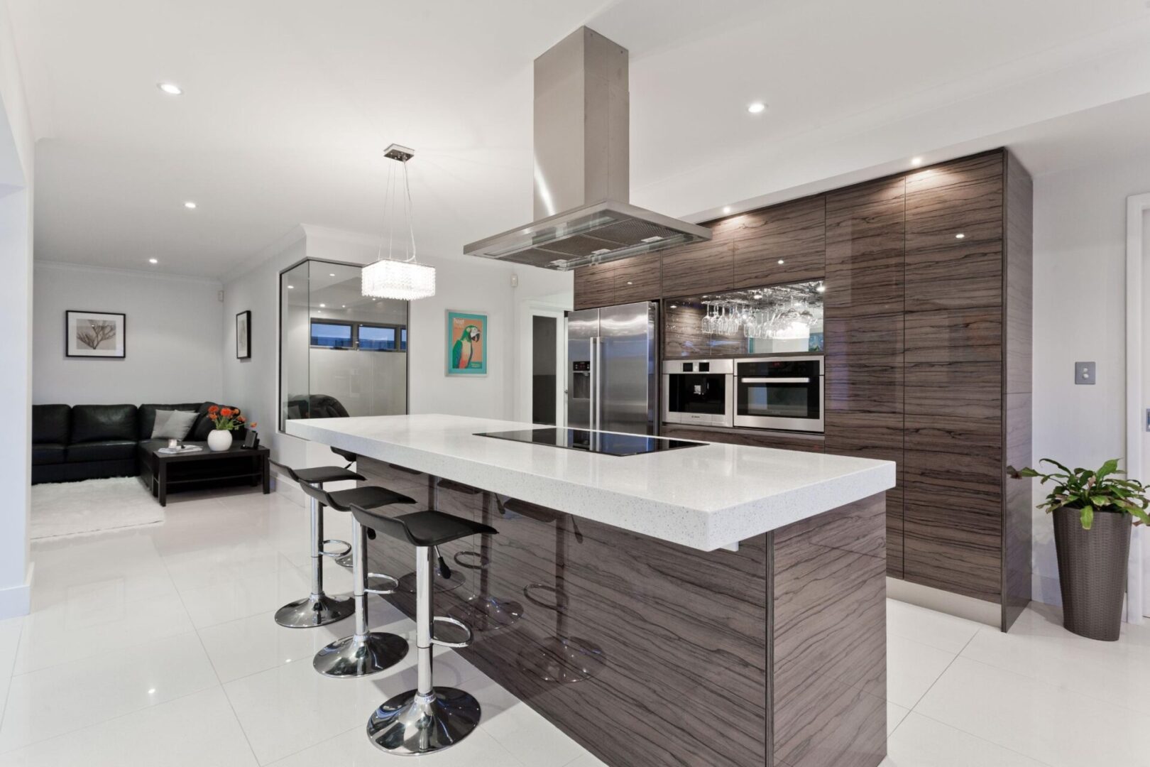 A kitchen with a stove, oven and refrigerator.