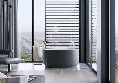 A bathroom with a large window and a tub